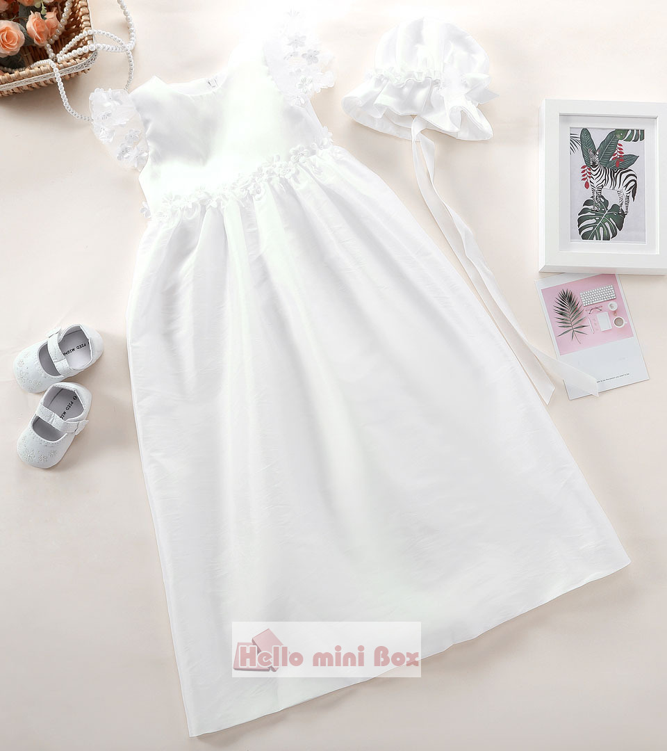 Simple style christening dress with decorative flowers on the waist and sleeves